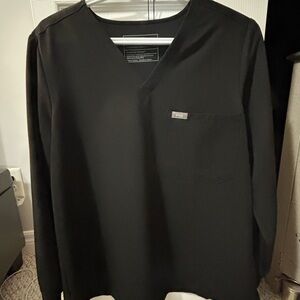 Figs long sleeve one pocket scrub top in black.